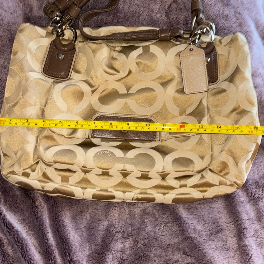 Tan canvas monogram Coach purse
